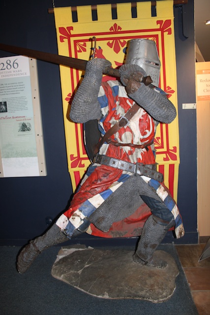 picture of a knight in helmet and mail