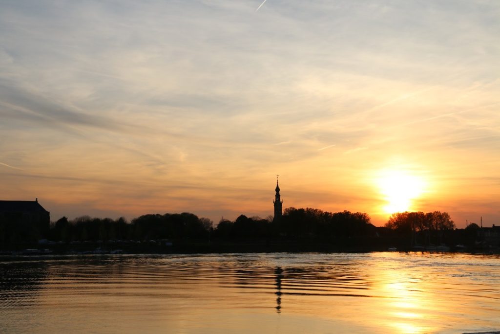 IMG 3009 The church spire silhouetted against the sunset as we sail away from Veere