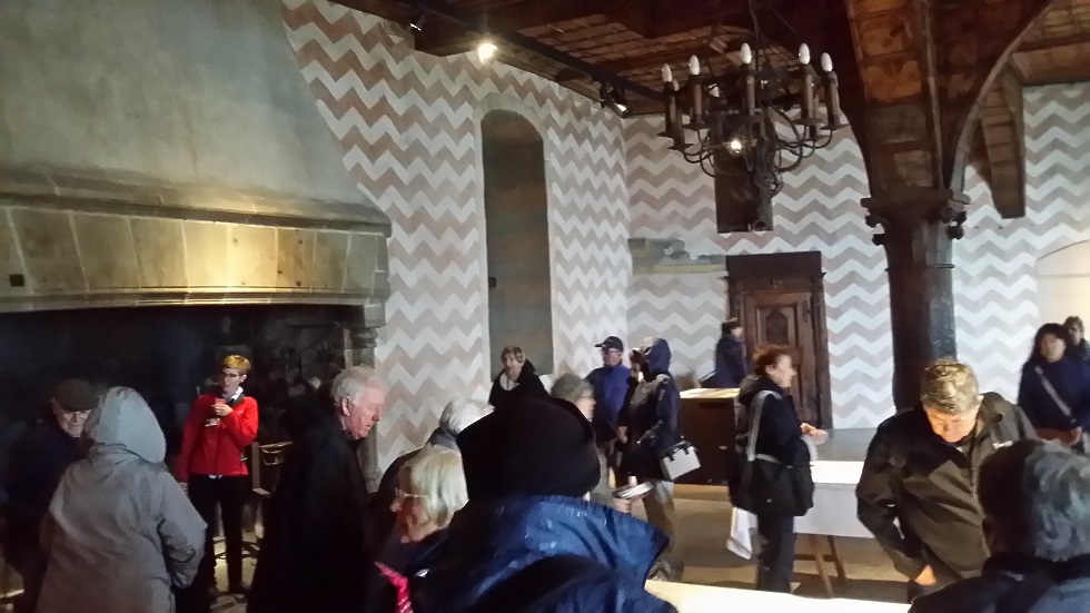 20160519 110523 The dining hall, with the guide standing in front of the fireplace where food was cooked