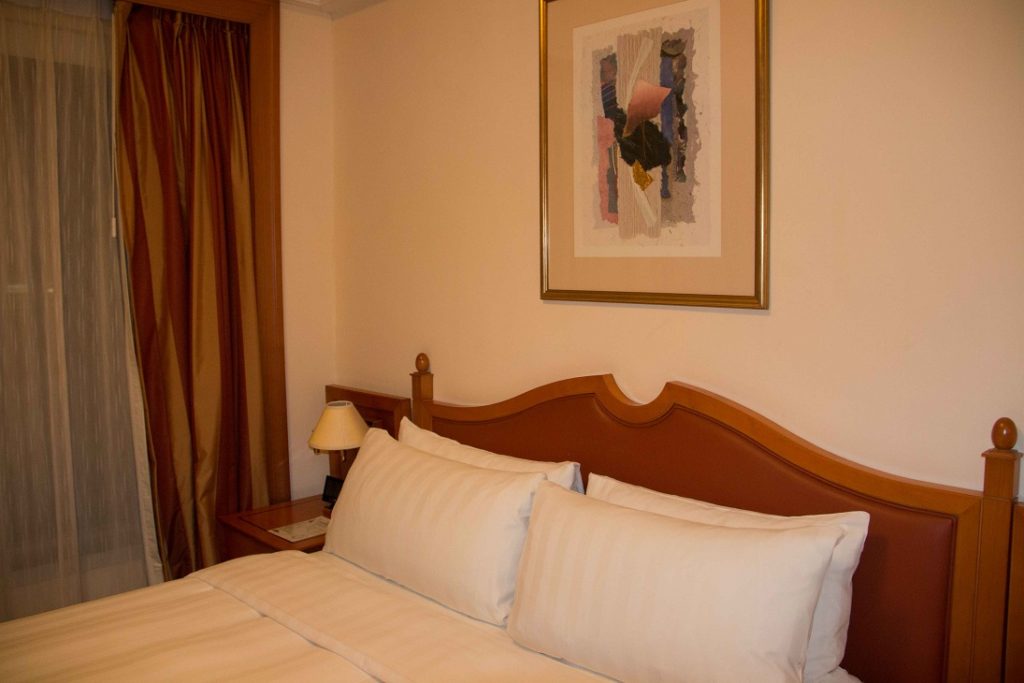 double bed in a hotel bedroom