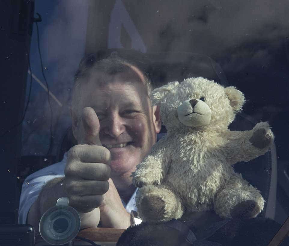 Our driver Dave with George the teddy