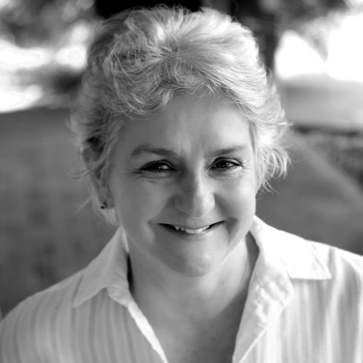 Picture of greta van der rol an older lady with grey hair and a smile