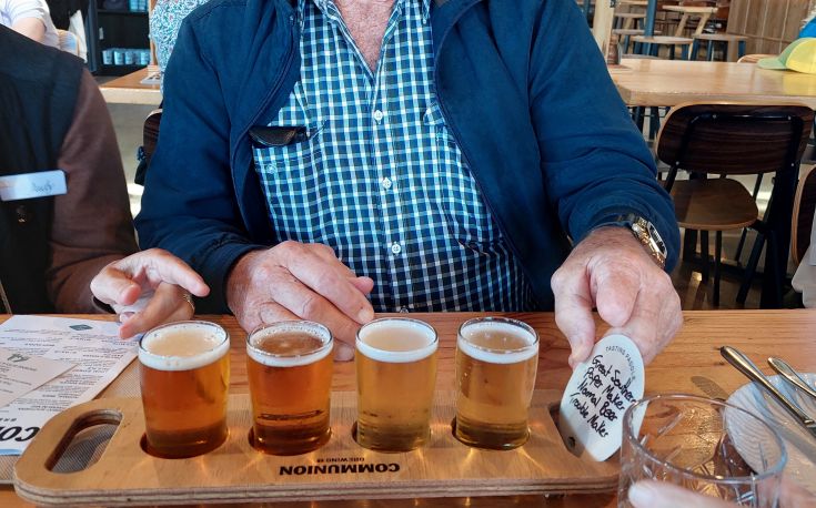 Burnie beer paddle showing four small glasses of different beers