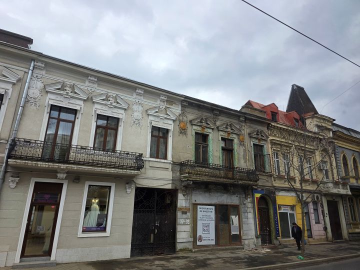 Bucharest decrepit neighbourhood a row of drab houses 